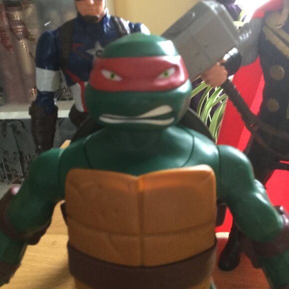 Action figures measure from 11 inches to 12 inches 3 have sound - Picture 2 of 5